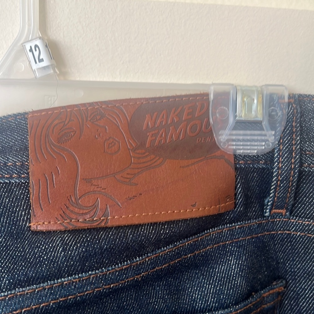 Naked & famous raw denim jeans. Slightly worn, never washed